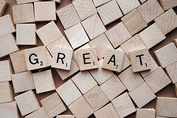 Wooden letters spelling the word Great